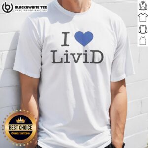 Alt Text: Good Dan Abrams smiling while wearing an I Love Livid T-shirt at a casual event.