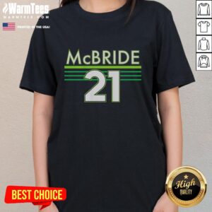 Hot Kayla McBride, Minnesota Lynx, showcasing ladies tee in a vibrant team color, perfect for fans.