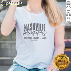 Alt Text: Ladies' khaki Richmond Response tee featuring Nashville Predators logo, perfect for fans since 1988.