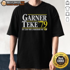 Alt Text: Good Garner Teke '79 Vote Scrap Iron And Rubberband Man T-Shirt featuring vintage design and vibrant colors.