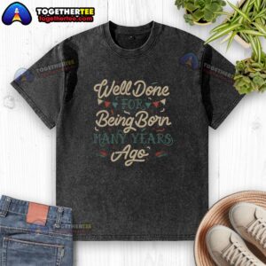 Good well done for being born many years ago washed T-shirt in a casual setting, perfect for vintage style lovers.