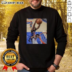 Awesome Joel Embiid Philadelphia 76ers sweatshirt featuring vibrant team colors and stylish design for fans.