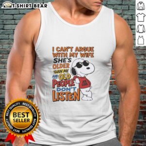 Retired husband wearing a tank top with a humorous quote about arguing with his older wife, showcasing fun relationship dynamics.