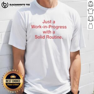 Alt Text: Awesome 'Just A Work In Progress With A Solid Routine' T-Shirt displayed on a mannequin, showcasing its motivational design.