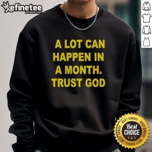 Premium 'A Lot Can Happen In A Month, Trust God' sweatshirt in cozy fabric, perfect for casual wear and inspiration.