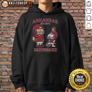 Alt Text: Nice Charlie Brown and Snoopy X Arkansas Razorbacks NCAA Football Est 1894 hoodie featuring vibrant graphics.