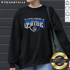 Alt Text: Premium Martin Luther King sweatshirt featuring a blue lions pride paw print graphic for the 2026 class year.