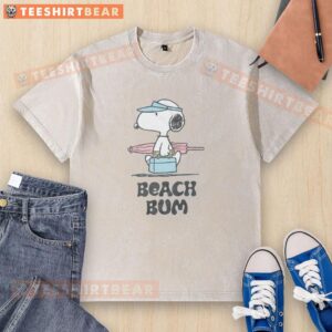 Good Peanuts Beach Bum Snoopy washed t-shirt featuring Snoopy relaxing on the beach, perfect for casual summer wear.