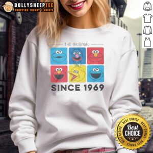 Alt Text: Cozy sweatshirt featuring original Sesame Street characters since 1969, perfect for fans of the beloved show.