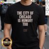 Awesome Ben Johnson 'The City Of Chicago Is Hungry Too' slogan t-shirt showcasing Chicago's vibrant urban style.