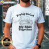 Awesome Cat Trying To Get My Shit Together T-Shirt featuring a playful cat graphic on a casual tee.
