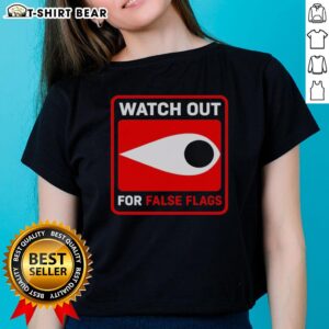 Stylish 'Top Watch Out For False Flags' eye graphic on ladies tee, perfect for fashion-forward women.