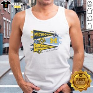 Awesome Michigan Wolverines flags on display in Ann Arbor, Michigan, featuring a trendy tank top design.