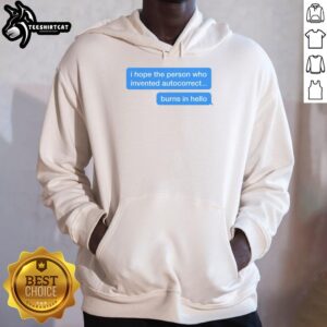 Person wearing a 'Good I Hope The Person Who Invented Autocorrect Burns In Hell' hoodie, showcasing humorous text design.