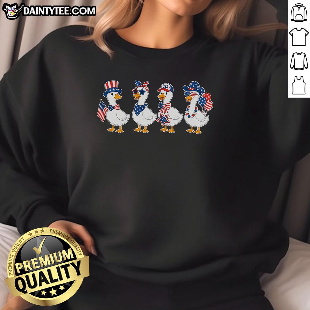 cute-fourth-of-july-patriotic-goose-group-sweatshirt Alt Text: Cute Fourth of July patriotic goose group sweatshirt featuring colorful geese in festive red, white, and blue attire.