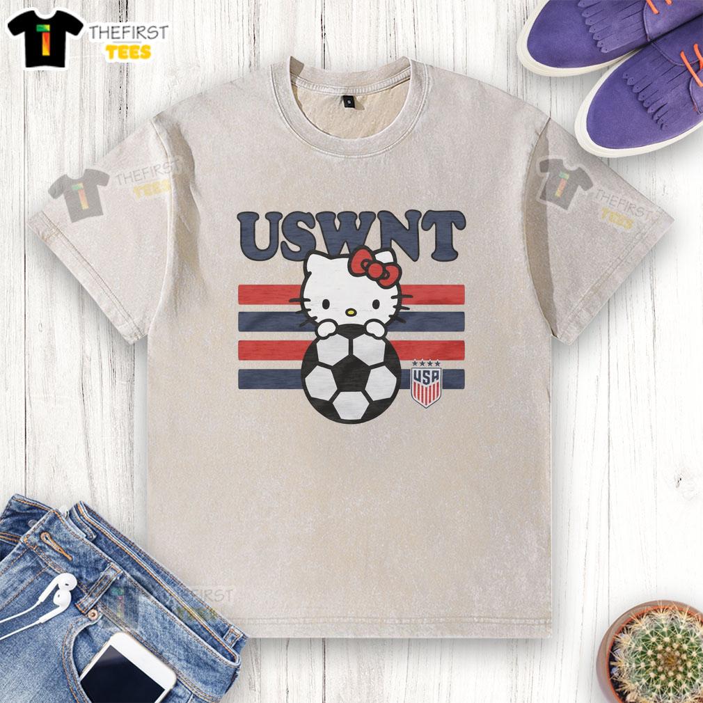cute-hello-kitty-x-uswnt-washed-t-shirt Cute Hello Kitty x USWNT washed t-shirt featuring a playful design, perfect for fans of both Hello Kitty and soccer.