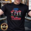 Alt Text: Cute Snoopy, Charlie Brown, Linus, and Lucy in Philadelphia Phillies baseball t-shirts, ready for game day fun.