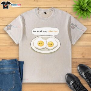 Pretty I'm Glad You Eggsist washed t-shirt featuring a fun egg graphic, perfect for casual wear and egg lovers.