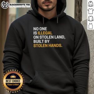 Alt Text: Sarcastic hoodie with the phrase 'No One Is Illegal On Stolen Land Built By Stolen Hands' promoting awareness.