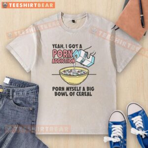 Person enjoying a big bowl of cereal while wearing a washed T-shirt, reflecting on a porn addiction.