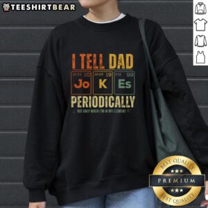 Alt Text: Cozy 'Top I Tell Dad Jokes Periodically' sweatshirt in a casual setting, perfect for dad joke enthusiasts.