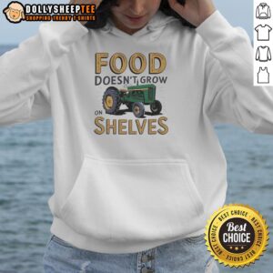 Vintage hoodie featuring 'Food Doesn't Grow on Shelves' design, perfect for tractor enthusiasts and sustainable farming advocates.