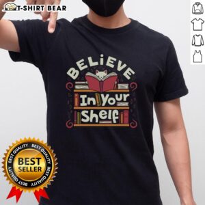 Alt Text: Original Believe In Your Shelf Cat T-Shirt featuring a playful cat design, perfect for cat lovers and casual wear.