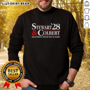 Alt Text: Nice Stewart Colbert 2028 Delivering Truth Hot and Hard sweatshirt featuring bold graphics and vibrant colors.