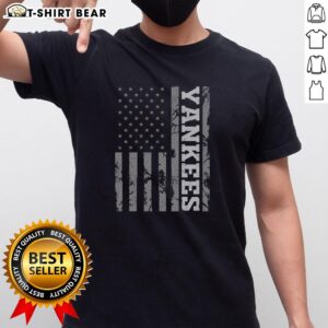 Top Yankee American Flag T-Shirt featuring a bold design of the American flag with a classic Yankee logo.