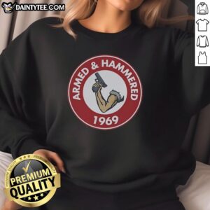 Premium Armed and Hammered 1969 Unise vintage sweatshirt featuring classic design and soft fabric for retro style.
