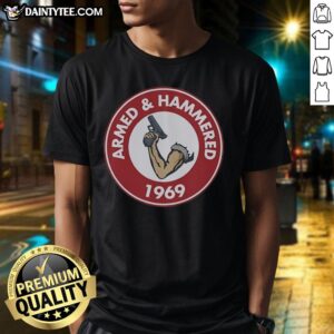 Premium Armed And Hammered 1969 Unise Vintage T-Shirt featuring retro design and classic fit, perfect for vintage style enthusiasts.