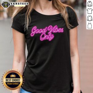Good Vibes Only purple neon ladies tee featuring bold text design on a stylish shirt for casual wear.