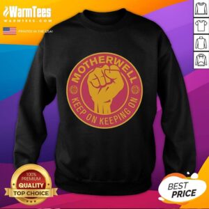 Premium Motherwell FC 'Keep On Keeping On' sweatshirt featuring a raised fist design for dedicated fans.