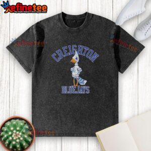 Funny Creighton Blue Jays grumpy mascot on a washed t-shirt, perfect for fans of the team and casual wear.