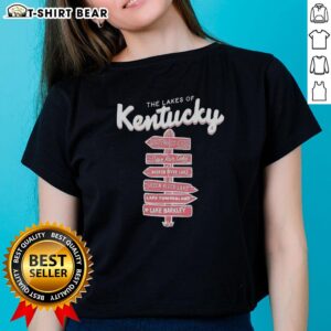 Alt Text: Ladies' tee featuring the Good The Lakes of Kentucky signpost, showcasing vibrant colors and scenic design.