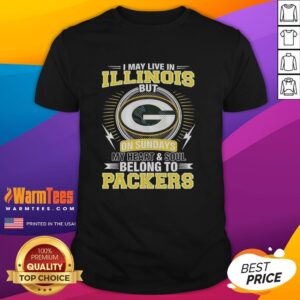 Green Bay Packers NFL t-shirt with 'I May Live In Illinois, But My Heart Belongs To Packers' slogan in bright colors.