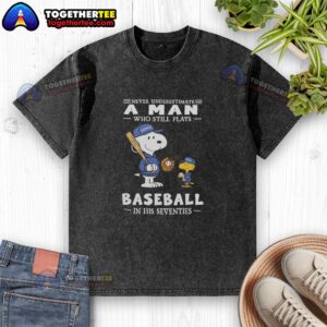 Alt Text: Nice washed t-shirt featuring Peanuts x Toronto Blue Jays design: 'Never underestimate a man who plays baseball in his seventies.'