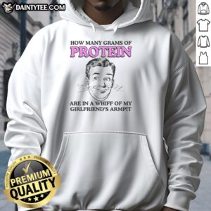 Close-up of a hoodie with a humorous design asking, 'How many grams of protein are in a whiff of my girlfriend's armpit?'