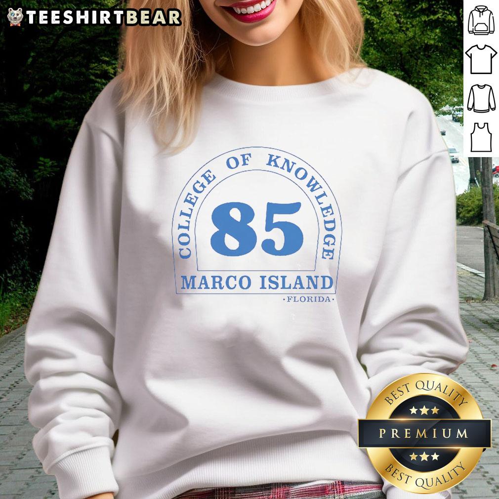 good-aloysius-aiken-rj-decker-college-of-knowledge-marco-island-sweatshirt Good Aloysius Aiken RJ Decker College of Knowledge sweatshirt displayed on a hanger, showcasing vibrant colors and logo.