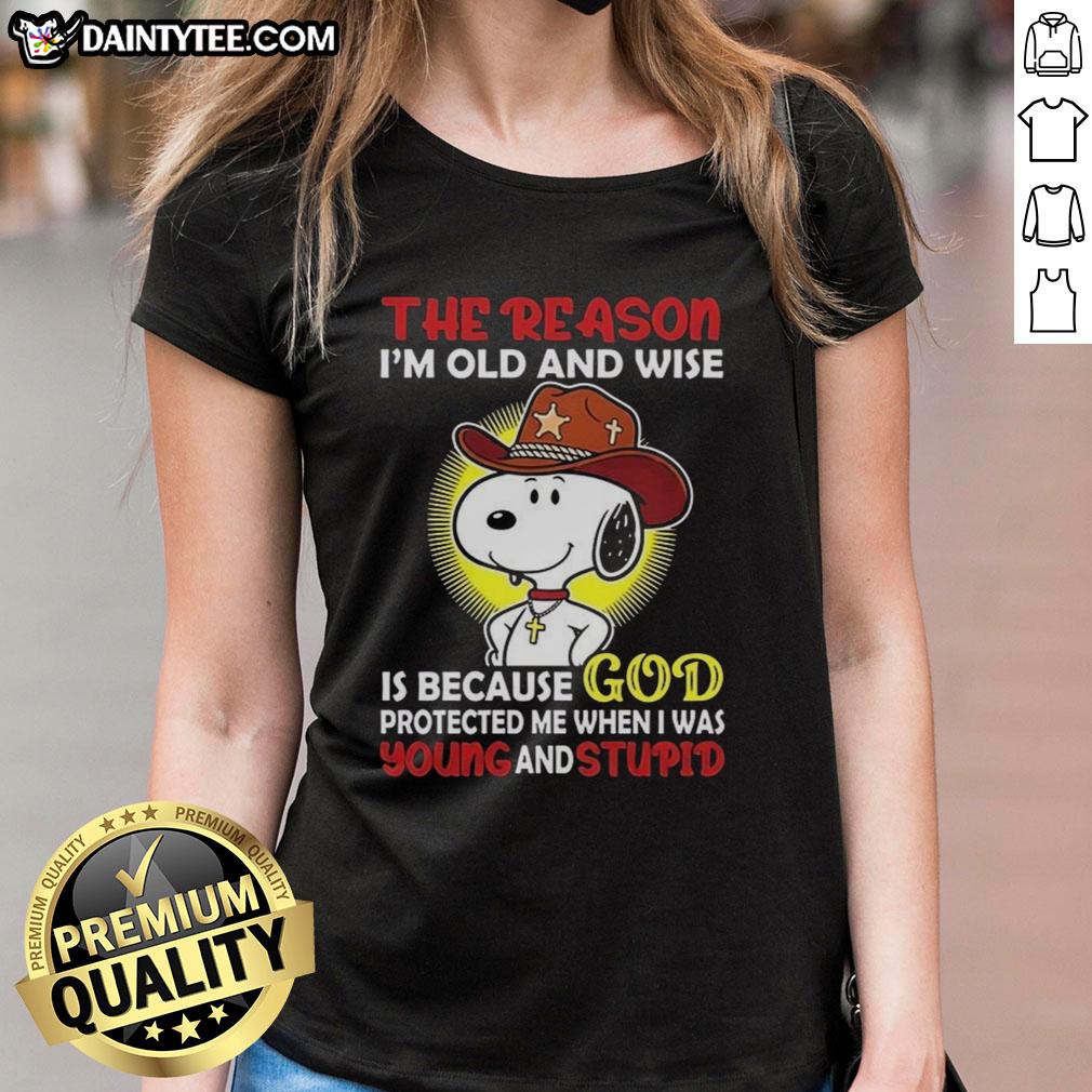 good-cowboy-snoopy-the-reason-im-old-and-wise-is-because-god-protected-me-when-i-was-young-and-stupid-ladies-tee Good Cowboy Snoopy tee featuring quote about wisdom from youth, perfect for ladies who appreciate humor and nostalgia.