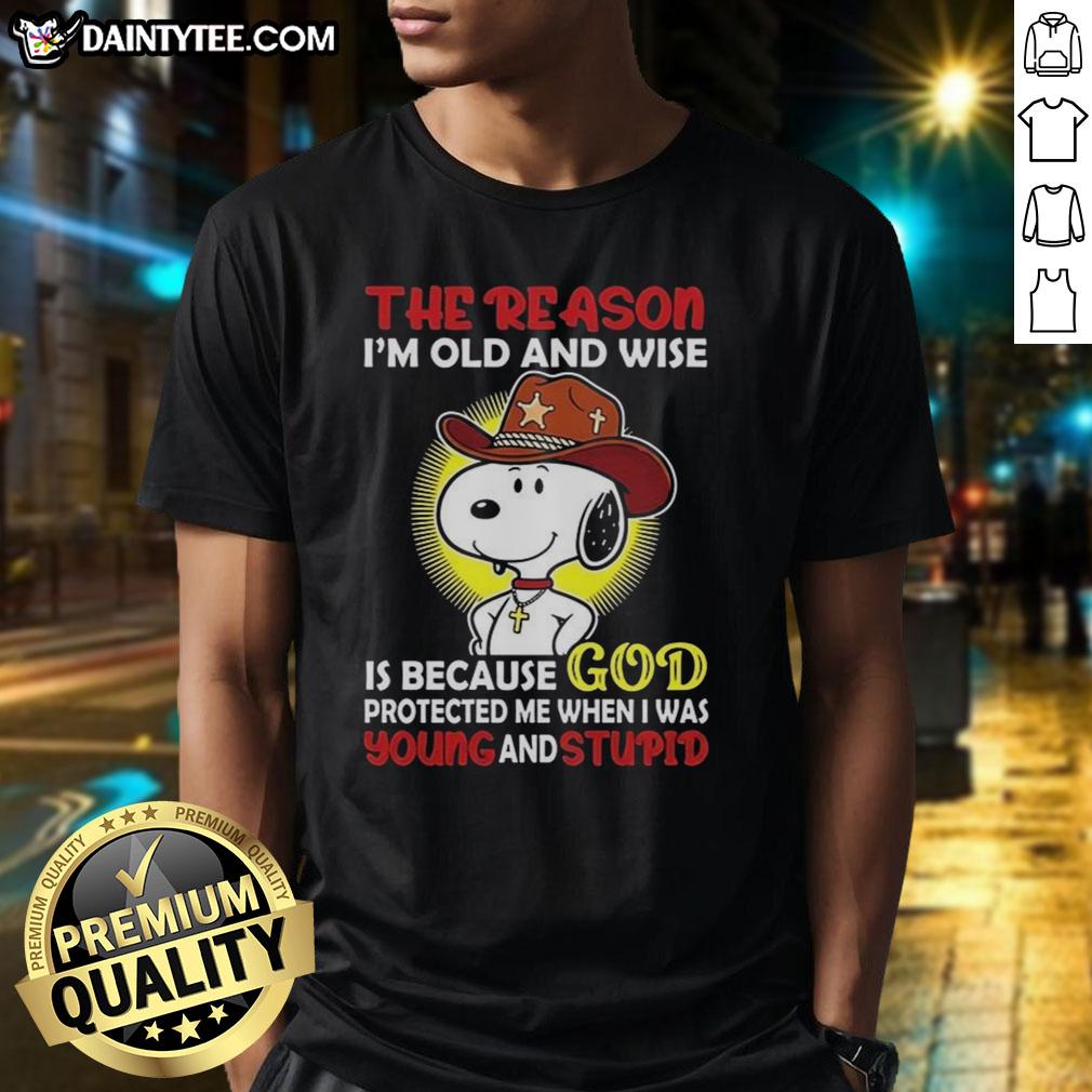 good-cowboy-snoopy-the-reason-im-old-and-wise-is-because-god-protected-me-when-i-was-young-and-stupid-t-shirt-1 Good Cowboy Snoopy graphic tee with 'I'm Old and Wise Because God Protected Me' quote, perfect for nostalgic fans.