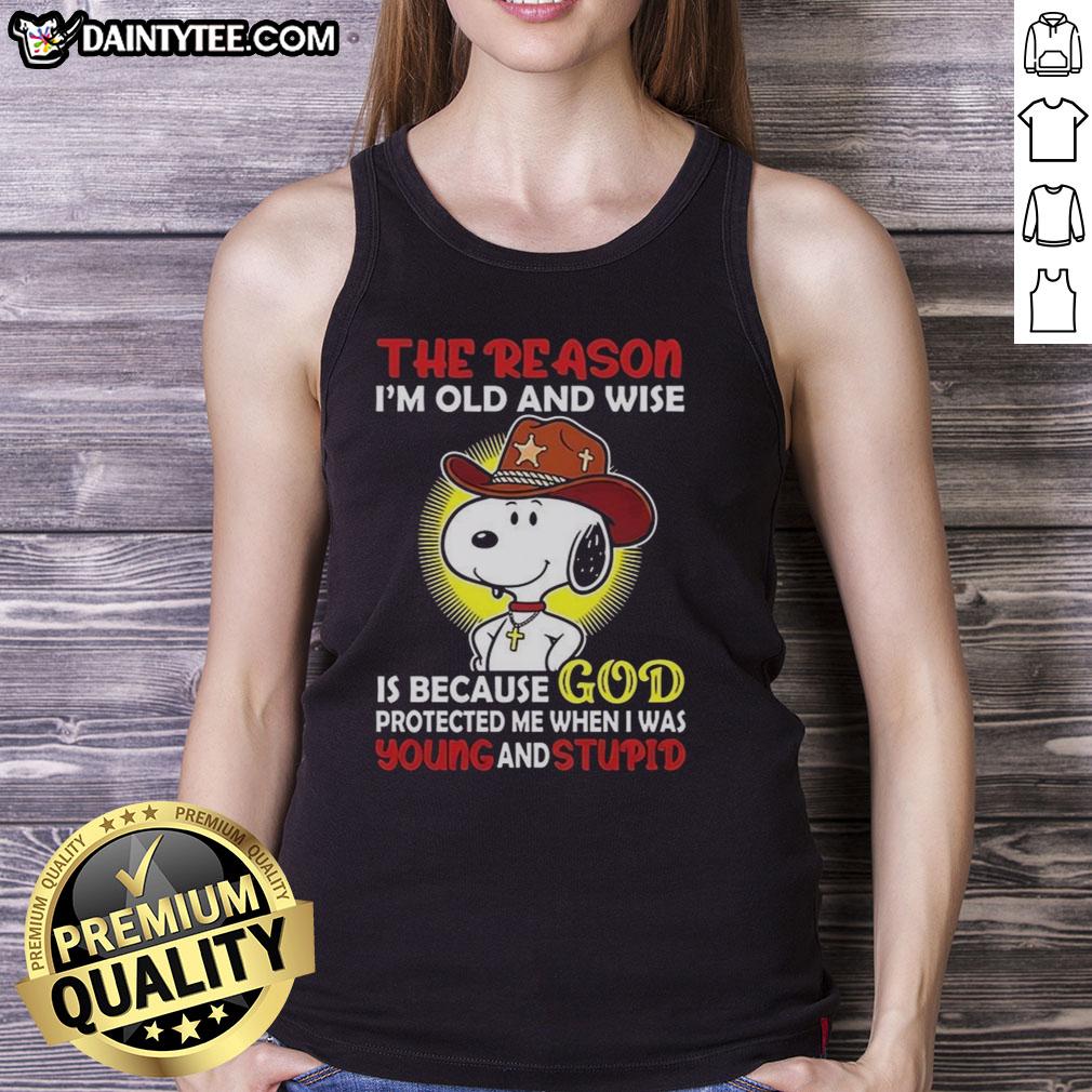 good-cowboy-snoopy-the-reason-im-old-and-wise-is-because-god-protected-me-when-i-was-young-and-stupid-tank-top Good Cowboy Snoopy tank top featuring 'The Reason I'm Old and Wise' quote, perfect for casual wear and nostalgia.