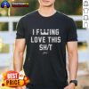 Alt Text: Good I Fcking Love This Shit T-Shirt featuring bold lettering on a stylish black tee for casual streetwear.