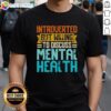 Good Introverted But Willing To Discuss Mental Health T-Shirt featuring a creative graphic design and positive message.