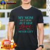 Vintage T-Shirt featuring 'Good My Mom Is Not Here But Her Love Never Left' design, perfect for honoring mother's love.