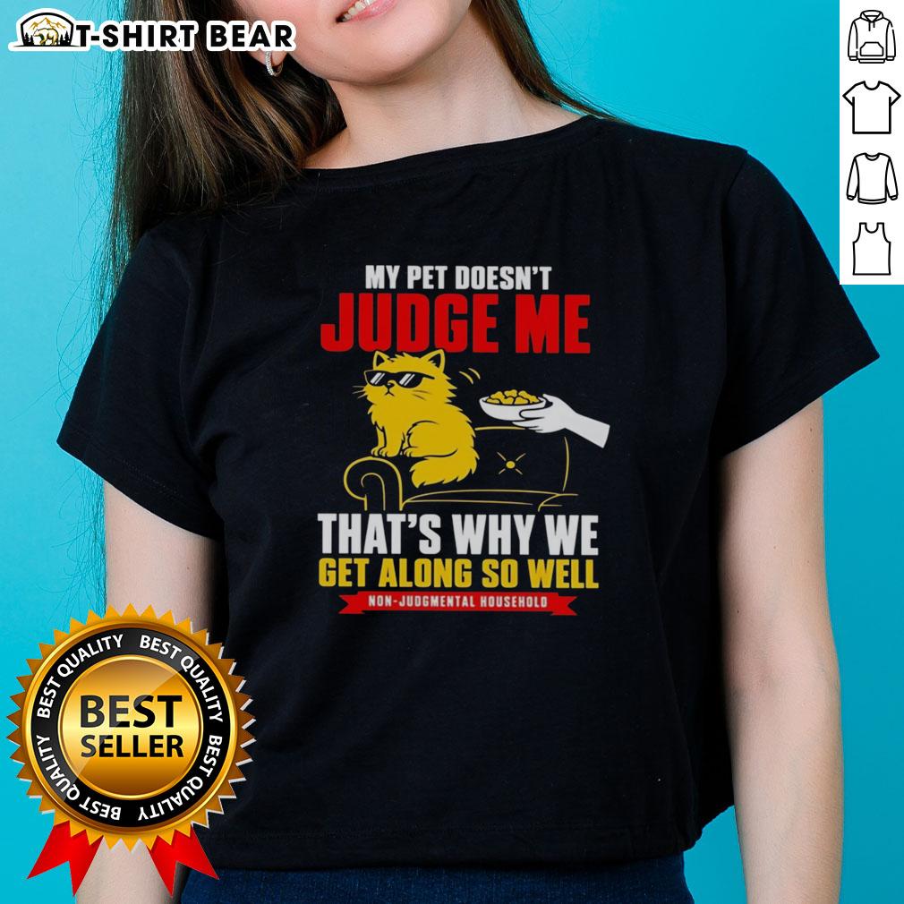 Good Orange Cat My Pet Doesn't Judge Me That's Why We Get Along So Well Ladies-Tee Playful orange cat relaxing on a tee, showcasing the bond of unconditional love and no judgment between pet and owner.