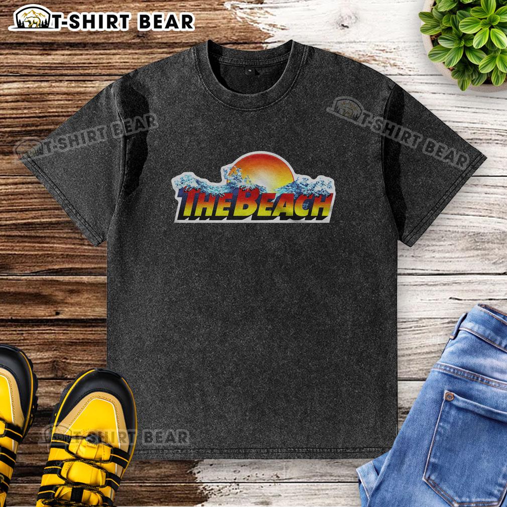 Good The Beach Waterpark Logo Washed T Shirt Good The Beach Waterpark logo on a washed t-shirt, featuring vibrant colors and a fun beach theme.