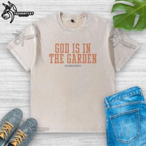 Premium New York Knicks 'God Is In The Garden' t-shirt showcasing big knick energy in a stylish washed design.