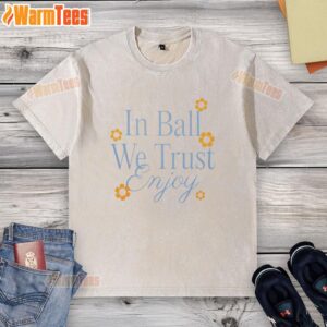 Pretty basketball-themed washed t-shirt with floral design, showcasing 'In Ball We Trust' slogan for sports enthusiasts.