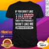 Retro T-shirt featuring 'Hot If You Don't Like Trump Then You Probably Won't Like Me' slogan, perfect for political debate.